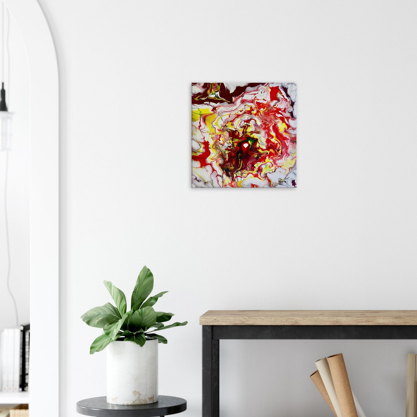 The 'Bonfire' print by Yana Virtuoso enhances the living room with its spirited red and yellow tones, adding a bold, artistic ambiance.